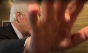 Cornyn Hand in Camera.png